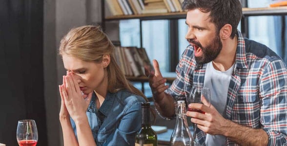 Photo of a man yelling at a woman Photo of a man yelling at a woman