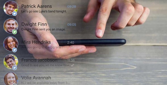 Photo of a person texting multiple people Photo of a person texting multiple people