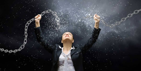 Photo of a woman breaking chains