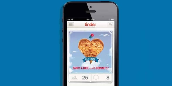 Photo of the Tinder and Domino's campaign Photo of the Tinder and Domino's campaign