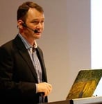 Photo of Mark Brooks speaking at iDate 2012