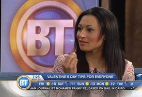 Photo of Natacha NoÃ«l being interviewed on TV