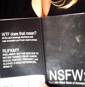 Photo of a woman reading NSFW Photo of a woman reading NSFW