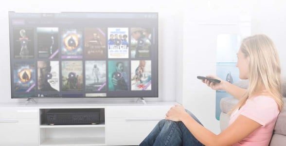 Photo of a woman browsing Stremio Photo of a woman browsing Stremio