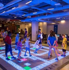 Photo of a light-up floor at MoMath Photo of a light-up floor at MoMath