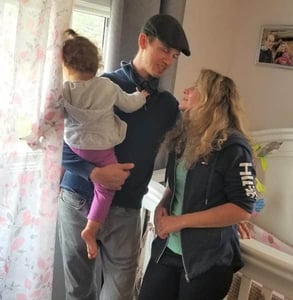 Photo of Andrei and Alina with their daughter Photo of Andrei and Alina with their daughter