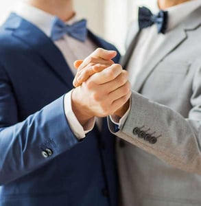 Photo of two men slow dancing