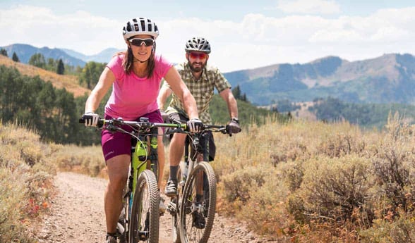 Photo of a couple mountain biking near Park City Photo of a couple mountain biking near Park City