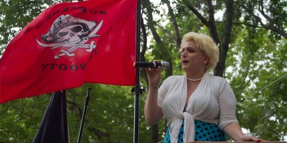 Photo of a person speaking at a FIGMENT event Photo of a person speaking at a FIGMENT event
