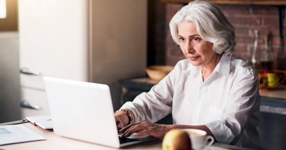 Photo of a senior woman on a laptop Photo of a senior woman on a laptop