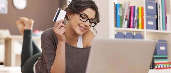 Photo of a woman paying for online services