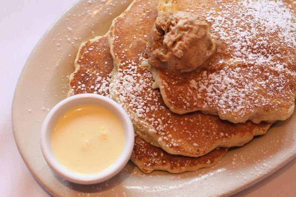 Photo of Southport Grocery and Cafe bread pudding pancakes.