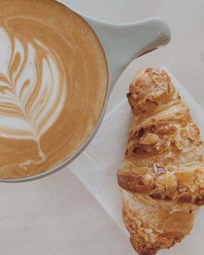 Photo of PT's coffee and croissant