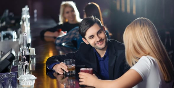 Photo of a couple at a bar