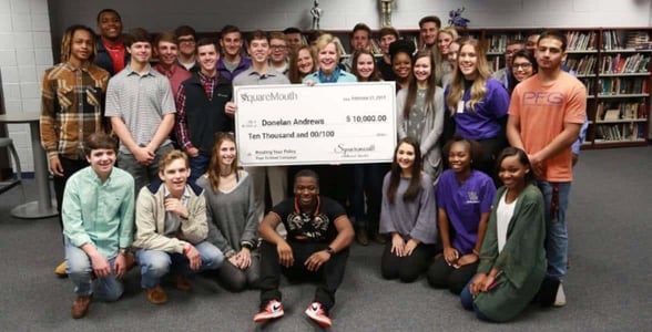Photo of Donelan Andrews and her students Photo of Donelan Andrews and her students