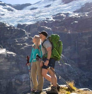 Photo of a couple hiking in the mountains Photo of a couple hiking in the mountains