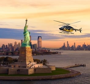 Photo of Zip Aviation helicopter by the Statue of Liberty