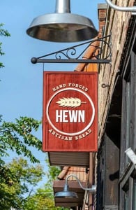 Photo of the Hewn sign Photo of the Hewn sign