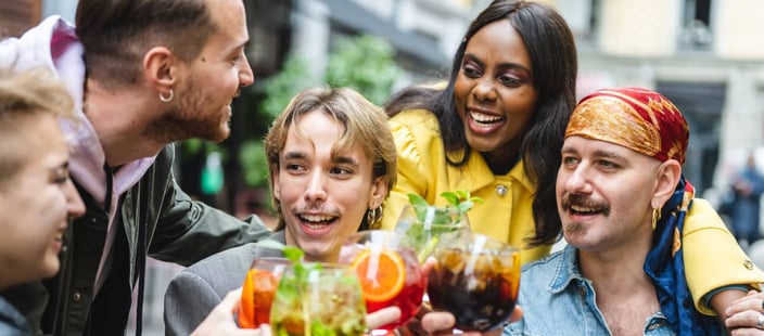 Diverse group of friends having fun at a gay bar Diverse group of friends having fun at a gay bar