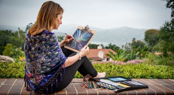 Photo of a woman painting