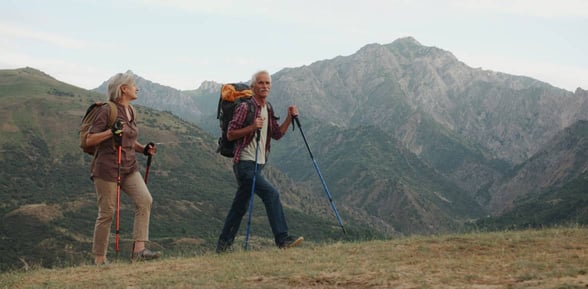man and woman hiking