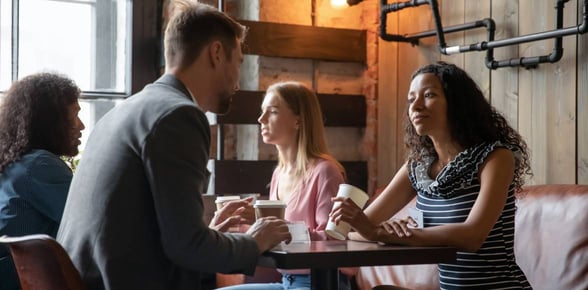 couple talking at table couple talking at table