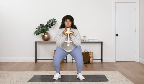 Photo of a woman working out in home