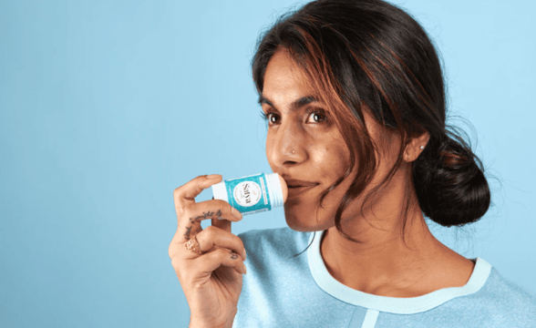 woman using Satya balm woman using Satya balm