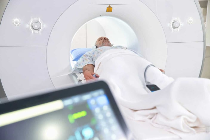 Male Patient Entering Hospital MRI Scanning Machine Male Patient Entering Hospital MRI Scanning Machine