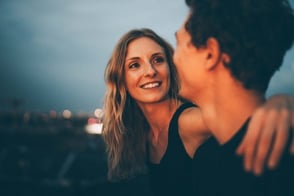 woman with arm around man, smiling woman with arm around man, smiling