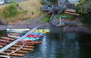 dock with many canoes dock with many canoes