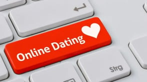 keyboard with red key that says online dating
