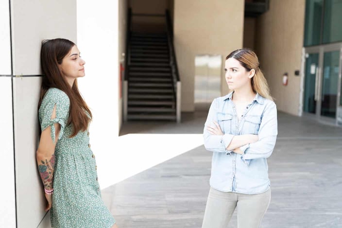 Lesbian couple looking unhappy Lesbian couple looking unhappy