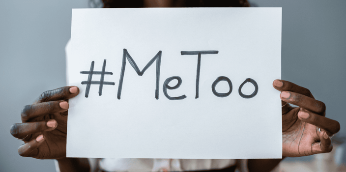 woman holding #MeToo sign woman holding #MeToo sign