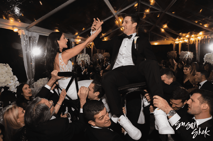 Susan Shek photograph depicting a nighttime action shot of a married couple dancing