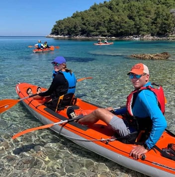 Backroads couple in a kayak