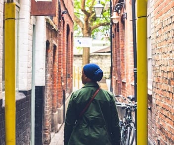 Chicago Center for Relationship Counseling woman walking through alley 
