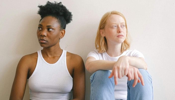 Chicago Center for Relationship Counseling two women sitting next to each other in white tops