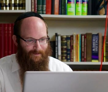 Rabbi Bernath using laptop Rabbi Bernath using laptop