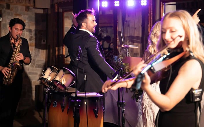 Wedding band with drums, violin, and sax Wedding band with drums, violin, and sax