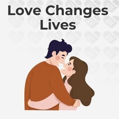 Love Changes Lives text on a gray background