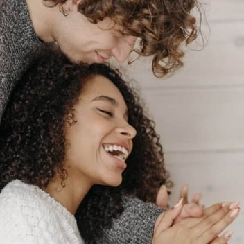 Inland Empire Couples Counseling a male and female couple laughing and cuddling together Inland Empire Couples Counseling a male and female couple laughing and cuddling together