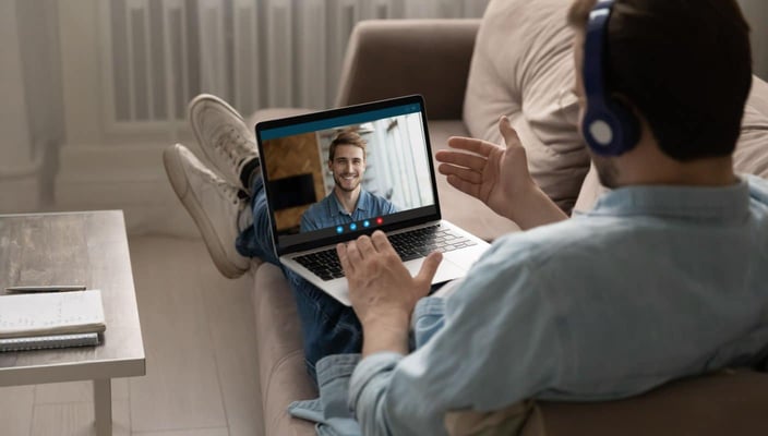 Two men chatting on a video call Two men chatting on a video call