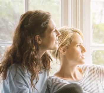 Photo of young female couple together
