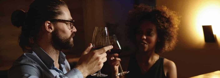 A couple drinking wine together