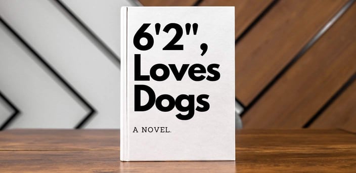 A Novel titled 6 Foot 2, Loves Dogs