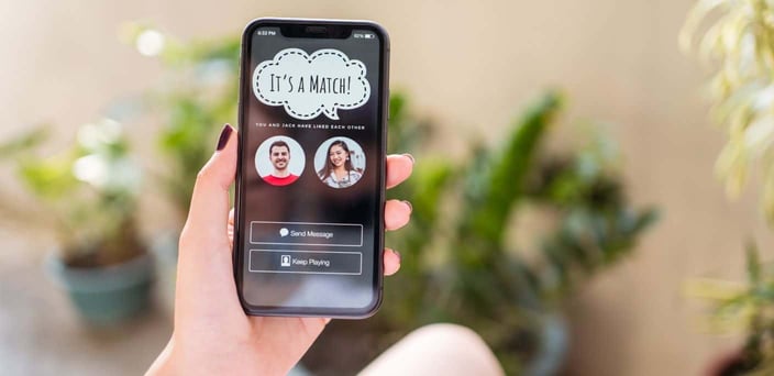 Photo of a couple matching in a Tinder-like app.
