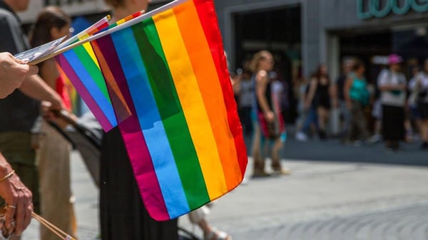 Rainbow pride flags displayed at an LGBTQ+ community event as France introduces new dating-app safety measures aimed at protecting LGBTQ+ users. Rainbow pride flags displayed at an LGBTQ+ community event as France introduces new dating-app safety measures aimed at protecting LGBTQ+ users.