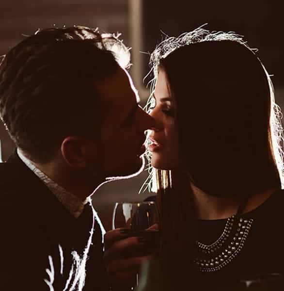 Photo of a couple kissing Photo of a couple kissing