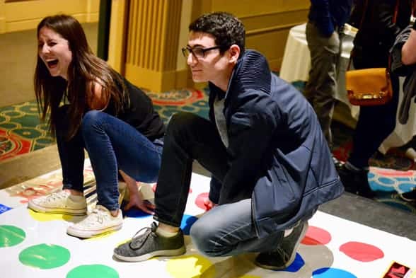 Photo of two people playing Twister at an unplugging event Photo of two people playing Twister at an unplugging event
